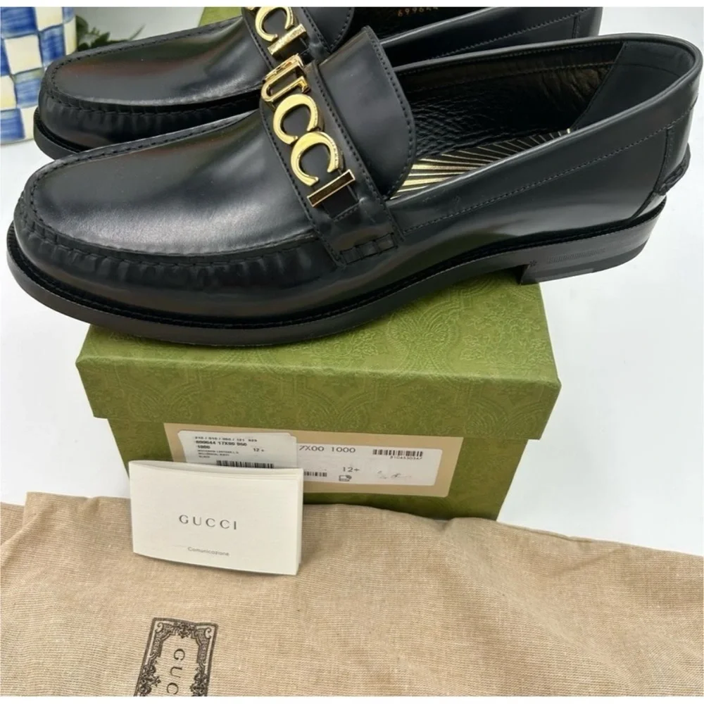 Gucci gold logo embellished leather loafers size 12.5 made in Italy